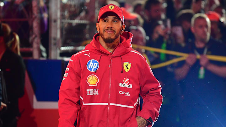 Nov 21, 2025; Las Vegas, NV, USA; Ferrari driver Lewis Hamilton (44) is introduced before the Las Vegas Grand Prix at Las Vegas Strip Circuit. Mandatory Credit: Gary A. Vasquez-Imagn Images