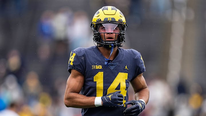 Michigan wide receiver Channing Goodwin (14) warm up before the spring game at Michigan Stadium in Ann Arbor on Saturday, April 19, 2025. Michigan wide receiver Channing Goodwin (14) warm up before the spring game at Michigan Stadium in Ann Arbor on Saturday, April 19, 2025.