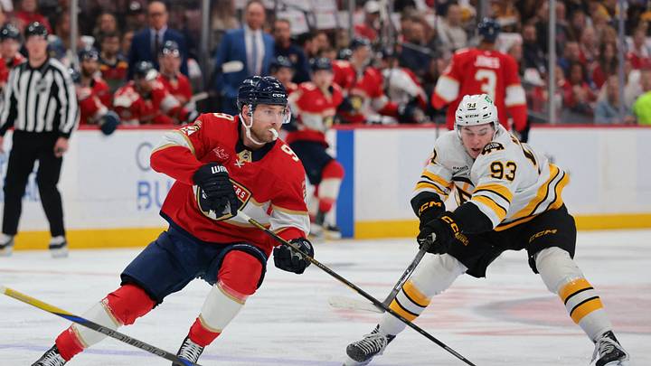 Apr 2, 2026; Sunrise, Florida, USA; Florida Panthers center Sam Bennett (9) moves the puck against Boston Bruins center Fraser Minten (93) during the first period at Amerant Bank Arena. Mandatory Credit: Sam Navarro-Imagn Images Apr 2, 2026; Sunrise, Florida, USA; Florida Panthers center Sam Bennett (9) moves the puck against Boston Bruins center Fraser Minten (93) during the first period at Amerant Bank Arena. Mandatory Credit: Sam Navarro-Imagn Images