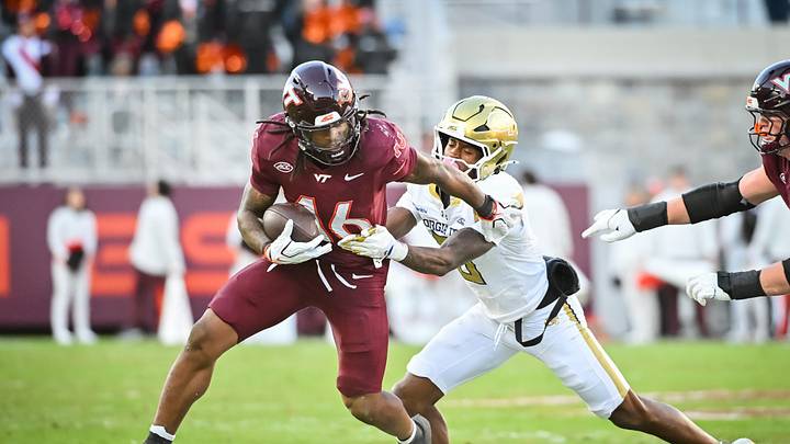 Oct 17, 2026; Blacksburg, Virginia, USA; Virginia Tech Hokies running back Jeffrey Overton Jr. (16) breaks a tackle from Georgia Tech Yellow Jackets defensive back Zachary Tobe (5) on his way for a touchdown during the third quarter at Lane Stadium. Mandatory Credit: Brian Bishop-Imagn Images Oct 17, 2026; Blacksburg, Virginia, USA; Virginia Tech Hokies running back Jeffrey Overton Jr. (16) breaks a tackle from Georgia Tech Yellow Jackets defensive back Zachary Tobe (5) on his way for a touchdown during the third quarter at Lane Stadium. Mandatory Credit: Brian Bishop-Imagn Images