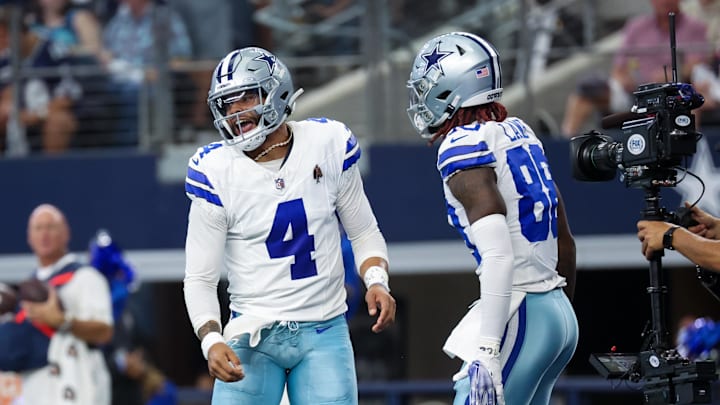Oct 1, 2023; Arlington, Texas, USA;  Dallas Cowboys quarterback Dak Prescott (4) celebrates with Dallas Cowboys wide receiver CeeDee Lamb (88) after throwing a touchdown pass during the first quarter against the New England Patriots at AT&T Stadium. Mandatory Credit: Kevin Jairaj-USA TODAY Sports