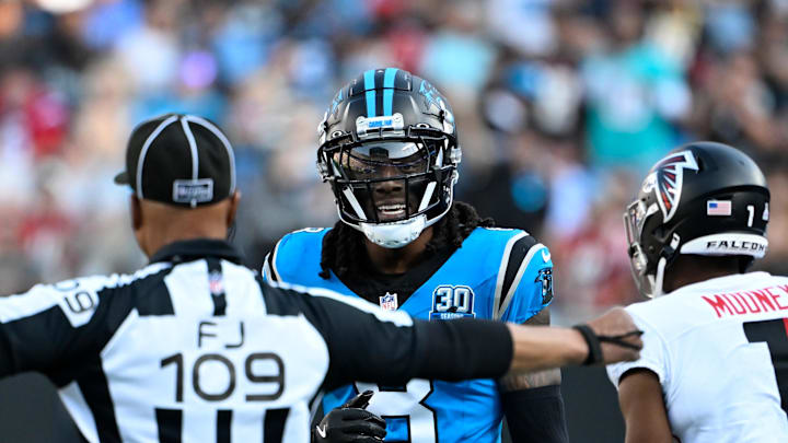 Oct 13, 2024; Charlotte, North Carolina, USA;  Carolina Panthers cornerback Jaycee Horn (8) is called for pass interferference on a pass intended for Atlanta Falcons wide receiver Darnell Mooney (1) in the first quarter at Bank of America Stadium. Mandatory Credit: Bob Donnan-Imagn Images