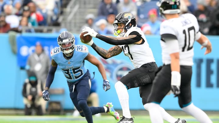 Dec 8, 2024; Nashville, Tennessee, USA;  Jacksonville Jaguars tight end Evan Engram (17) makes a catch Tennessee Titans during the first half at Nissan Stadium. Mandatory Credit: Steve Roberts-Imagn Images