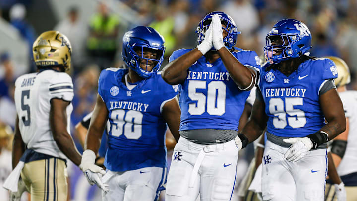 Kentucky Wildcats defensive lineman Darrion Henry-Young (50) reacts after making a tackle on Akron. Sept. 16, 2023 Kentucky Wildcats defensive lineman Darrion Henry-Young (50) reacts after making a tackle on Akron. Sept. 16, 2023