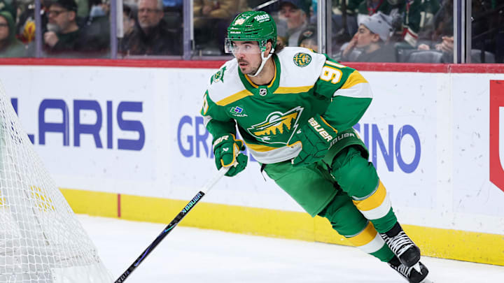 Nov 9, 2025; Saint Paul, Minnesota, USA; Minnesota Wild left wing Marcus Johansson (90) skates with the puck during the first period against the Calgary Flames at Grand Casino Arena. Mandatory Credit: Matt Krohn-Imagn Images