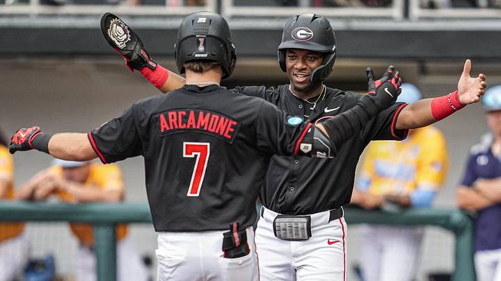 May 29, 2026; Athens, GA, USA; Georgia Bulldogs infielder Ryan Wynn (0) reacts with catcher Jack Arcamone (7) after Arcamone hit a home run against the LIU Sharks at Foley Field. Mandatory Credit: Dale Zanine-Imagn Images May 29, 2026; Athens, GA, USA; Georgia Bulldogs infielder Ryan Wynn (0) reacts with catcher Jack Arcamone (7) after Arcamone hit a home run against the LIU Sharks at Foley Field. Mandatory Credit: Dale Zanine-Imagn Images