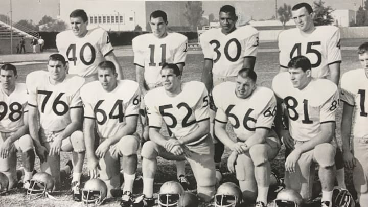 Bill Douglas (11) quarterbacked the Huskies to the 1964 Rose Bowl against Illinois.