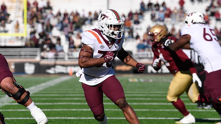 Nov 11, 2023; Chestnut Hill, Massachusetts, USA; Virginia Tech Hokies running back Bhayshul Tuten (33) runs a route against the Virginia Tech Hokies  during the first half at Alumni Stadium. Mandatory Credit: Eric Canha-USA TODAY Sports