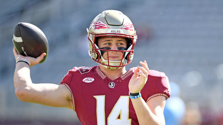 Nov 2, 2024; Tallahassee, Florida, USA;  Florida State Seminoles quarterback Luke Kromenhoek (14) warms up before a game against the North Carolina Tarheels at Doak S. Campbell Stadium. Mandatory Credit: Robert Myers-Imagn Images