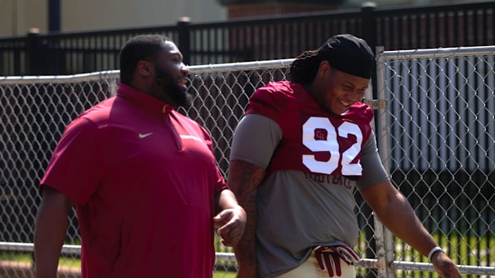 FSU football players walk into the first spring practice of the spring season on Wednesday, March 19, 2025