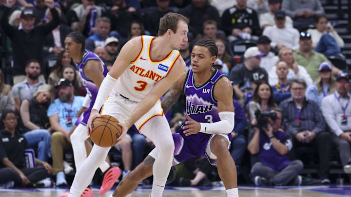 Nov 13, 2025; Salt Lake City, Utah, USA; Atlanta Hawks guard Luke Kennard (3) looks to pass against Utah Jazz guard Keyonte George (3) during the second half at Delta Center. Mandatory Credit: Rob Gray-Imagn Images