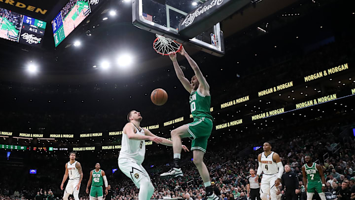 Mar 2, 2025; Boston, Massachusetts, USA; Boston Celtics center Luke Kornet (40) dunks the ball during the second half against the Denver Nuggets at TD Garden. Mandatory Credit: Paul Rutherford-Imagn Images Mar 2, 2025; Boston, Massachusetts, USA; Boston Celtics center Luke Kornet (40) dunks the ball during the second half against the Denver Nuggets at TD Garden. Mandatory Credit: Paul Rutherford-Imagn Images