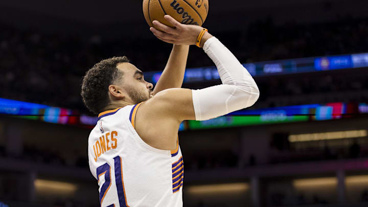 Apr 13, 2025; Sacramento, California, USA;  Phoenix Suns guard Tyus Jones (21) takes a three-point shot against the Sacramento Kings during the third quarter at Golden 1 Center. Mandatory Credit: John Hefti-Imagn Images