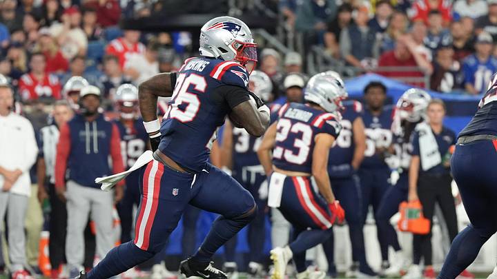 New England Patriots running back Hassan Haskins (26) runs with the ball against the Philadelphia Eagles during the first half at Gillette Stadium during the 2026 preseason.
