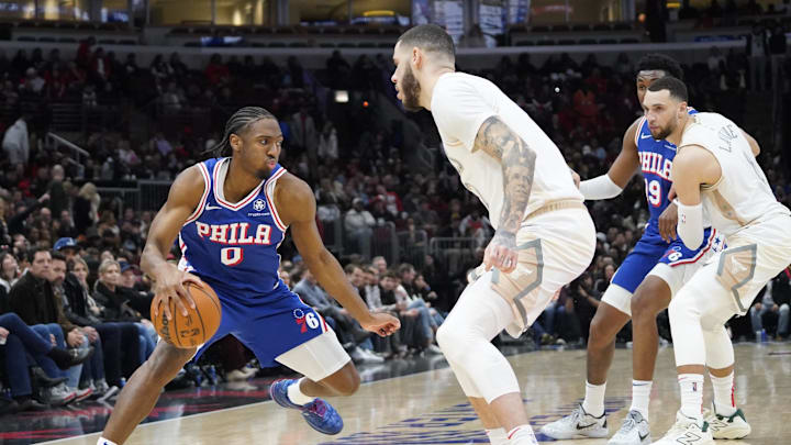 Jan 25, 2025; Chicago, Illinois, USA; Chicago Bulls guard Lonzo Ball (2) defends Philadelphia 76ers guard Tyrese Maxey (0) during the second half at United Center. Mandatory Credit: David Banks-Imagn Images