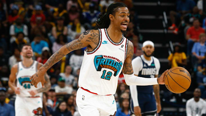 Apr 18, 2025; Memphis, Tennessee, USA; Memphis Grizzlies guard Ja Morant (12) dribbles up the court during the fourth quarter against the Dallas Mavericks at FedExForum. Mandatory Credit: Petre Thomas-Imagn Images Apr 18, 2025; Memphis, Tennessee, USA; Memphis Grizzlies guard Ja Morant (12) dribbles up the court during the fourth quarter against the Dallas Mavericks at FedExForum. Mandatory Credit: Petre Thomas-Imagn Images