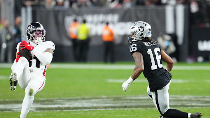 Dec 16, 2024; Paradise, Nevada, USA; Atlanta Falcons safety Justin Simmons (31) intercepts a pass indended for Las Vegas Raiders wide receiver Jakobi Meyers (16) during the fourth quarter at Allegiant Stadium. Mandatory Credit: Stephen R. Sylvanie-Imagn Images Dec 16, 2024; Paradise, Nevada, USA; Atlanta Falcons safety Justin Simmons (31) intercepts a pass indended for Las Vegas Raiders wide receiver Jakobi Meyers (16) during the fourth quarter at Allegiant Stadium. Mandatory Credit: Stephen R. Sylvanie-Imagn Images