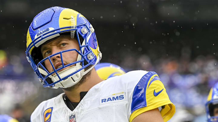 Dec 10, 2023; Baltimore, Maryland, USA;  Los Angeles Rams quarterback Matthew Stafford (9) looks ontotn her field before the game against the Baltimore Ravens ]at M&T Bank Stadium. Mandatory Credit: Tommy Gilligan-Imagn Images