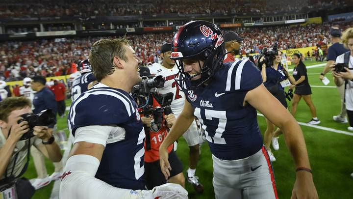 Mississippi Rebels kicker Lucas Carneiro celebrates with safety Andy Jaffe after kicking the game winning field goal as time expires against the Louisville Cardinals at Nissan Stadium.  Mandatory Credit: Steve Roberts-Imagn Images