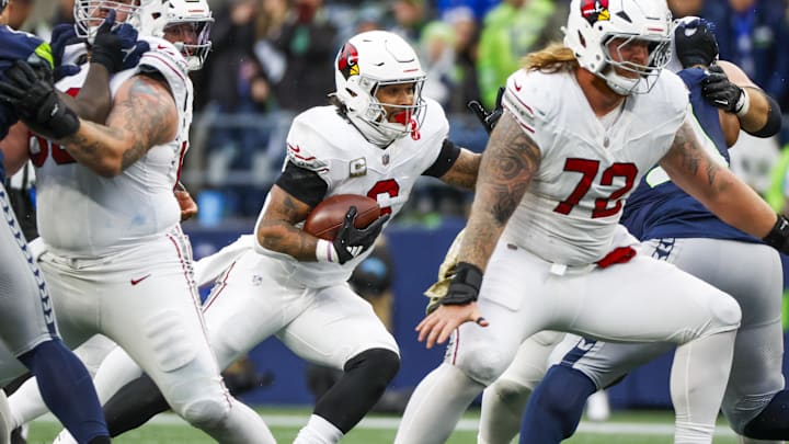 Nov 24, 2024; Seattle, Washington, USA; Arizona Cardinals running back James Conner (6) rushes against the Seattle Seahawks during the third quarter at Lumen Field. Mandatory Credit: Joe Nicholson-Imagn Images Nov 24, 2024; Seattle, Washington, USA; Arizona Cardinals running back James Conner (6) rushes against the Seattle Seahawks during the third quarter at Lumen Field. Mandatory Credit: Joe Nicholson-Imagn Images