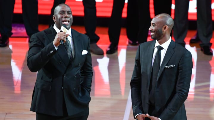 Dec 18, 2017; Los Angeles, CA, USA; Earvin \"Magic\" Johnson addresses the Staples Center crowd during a halftime ceremony retiring Kobe Bryant's two uniform numbers. Mandatory Credit: Robert Hanashiro-USA TODAY Sports Dec 18, 2017; Los Angeles, CA, USA; Earvin \"Magic\" Johnson addresses the Staples Center crowd during a halftime ceremony retiring Kobe Bryant's two uniform numbers. Mandatory Credit: Robert Hanashiro-USA TODAY Sports