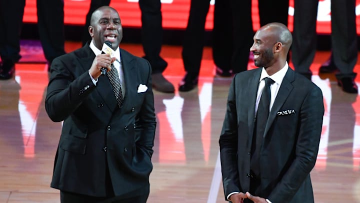 Dec 18, 2017; Los Angeles, CA, USA; Earvin "Magic" Johnson addresses the Staples Center crowd during a halftime ceremony retiring Kobe Bryant's two uniform numbers. Mandatory Credit: Robert Hanashiro-Imagn Images