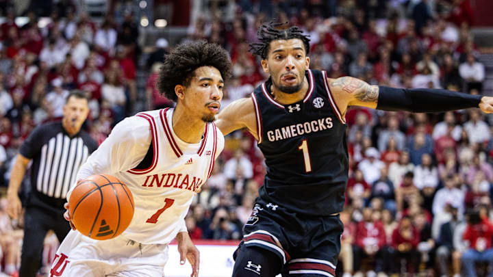 Nov 16, 2024; Bloomington, Indiana, USA; Indiana Hoosiers guard Myles Rice (1) dribbles the ball while South Carolina Gamecocks guard Jacobi Wright (1) defends in the first half at Simon Skjodt Assembly Hall. Mandatory Credit: Trevor Ruszkowski-Imagn Images