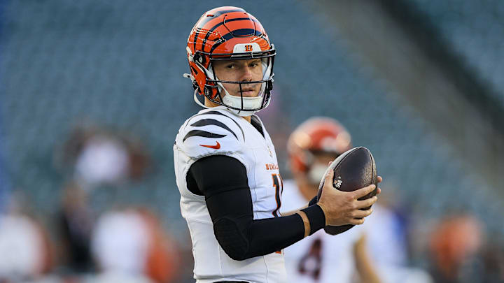 Aug 22, 2024; Cincinnati, Ohio, USA; Cincinnati Bengals quarterback Logan Woodside (11) stands on the field during warmups before the game against the Indianapolis Colts at Paycor Stadium. Mandatory Credit: Katie Stratman-Imagn Images