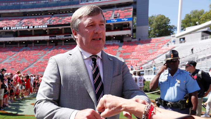 Georgia coach Kirby Smart shakes hands with fans before the start of a NCAA college football game in Athens, on Saturday, Sept. 7, 2024.