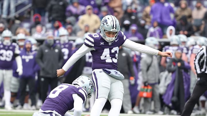 Nov 29, 2025; Manhattan, Kansas, USA; Kansas State Wildcats place kicker Luis Rodriguez (43) kicks a PAT in the fourth quarter against the Colorado Buffaloes at Bill Snyder Family Football Stadium. 