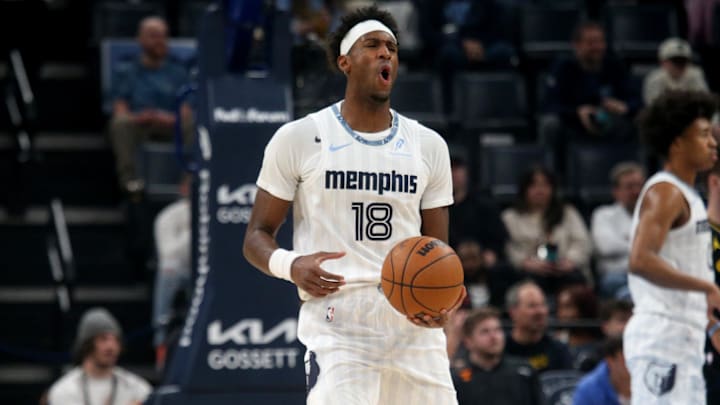 Feb 25, 2026; Memphis, Tennessee, USA; Memphis Grizzlies forward Olivier-Maxence Prosper (18) reacts during the first quarter against the Golden State Warriors at FedExForum. Mandatory Credit: Petre Thomas-Imagn Images