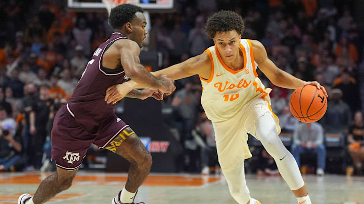 Tennessee forward Nate Ament (10) pushes against Texas A&M guard Jacari Lane (5) during a NCAA basketball game between Tennessee and Texas A&M at Thompson-Boling Arena at Food City Center in Knoxville, Tenn., on Jan. 13, 2026.