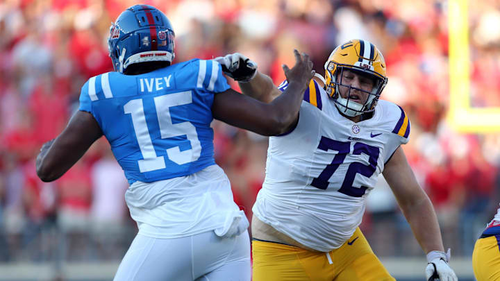 Sep 30, 2023; Oxford, Mississippi, USA; LSU Tigers offensive linemen Garrett Dellinger (72) blocks Mississippi Rebels defensive linemen Jared Ivey (15) during the first half at Vaught-Hemingway Stadium. Mandatory Credit: Petre Thomas-Imagn Images