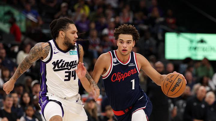 Oct 21, 2026; Inglewood, California, USA; Los Angeles Clippers guard Keaton Wagler (1) dribbles the ball in between Sacramento Kings guard Emanuel Sharp (34) and guard Darius Acuff Jr. (5) during the second quarter at Intuit Dome. Mandatory Credit: Kiyoshi Mio-Imagn Images Oct 21, 2026; Inglewood, California, USA; Los Angeles Clippers guard Keaton Wagler (1) dribbles the ball in between Sacramento Kings guard Emanuel Sharp (34) and guard Darius Acuff Jr. (5) during the second quarter at Intuit Dome. Mandatory Credit: Kiyoshi Mio-Imagn Images