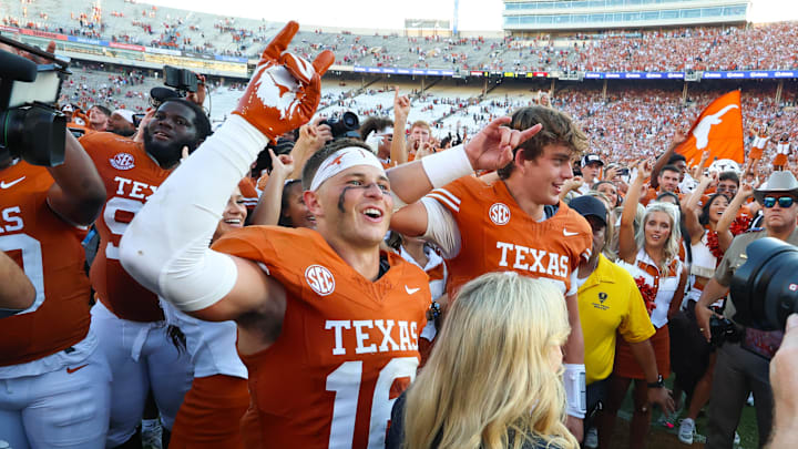 Oct 11, 2025; Dallas, Texas, USA;  Texas Longhorns defensive back Michael Taaffe (16) celebrates with Texas Longhorns quarterback Arch Manning (16) after the game against the Oklahoma Sooners at the Cotton Bowl. Mandatory Credit: Kevin Jairaj-Imagn Images