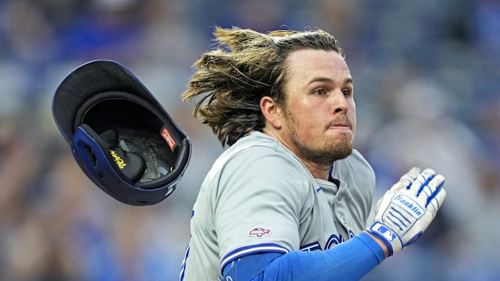 Apr 24, 2024; Kansas City, Missouri, USA; Toronto Blue Jays outfielder Addison Barger (47) loses his Apr 24, 2024; Kansas City, Missouri, USA; Toronto Blue Jays outfielder Addison Barger (47) loses his