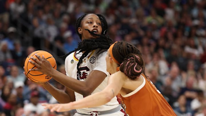 Apr 4, 2025; Tampa, FL, USA; South Carolina Gamecocks forward Joyce Edwards (8) controls the ball against Texas Longhorns guard Ndjakalenga Mwenentanda (32) during the third quarter in a semifinal of the women's 2025 NCAA tournament at Amalie Arena. Mandatory Credit: Nathan Ray Seebeck-Imagn Images Apr 4, 2025; Tampa, FL, USA; South Carolina Gamecocks forward Joyce Edwards (8) controls the ball against Texas Longhorns guard Ndjakalenga Mwenentanda (32) during the third quarter in a semifinal of the women's 2025 NCAA tournament at Amalie Arena. Mandatory Credit: Nathan Ray Seebeck-Imagn Images