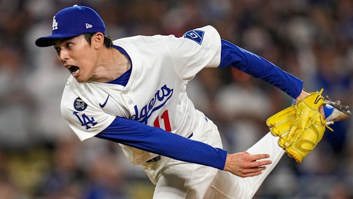 Los Angeles Dodgers pitcher Roki Sasaki (11) throws a pitch in the ninth inning of the MLB National League Wild Card Game 2 between the Los Angeles Dodgers and the Cincinnati Reds at Dodger Stadium in Los Angeles on Wednesday, Oct. 1, 2025. The Reds were eliminated from the postseason with an 8-4 loss to the reining World Series Champions La Dodgers.