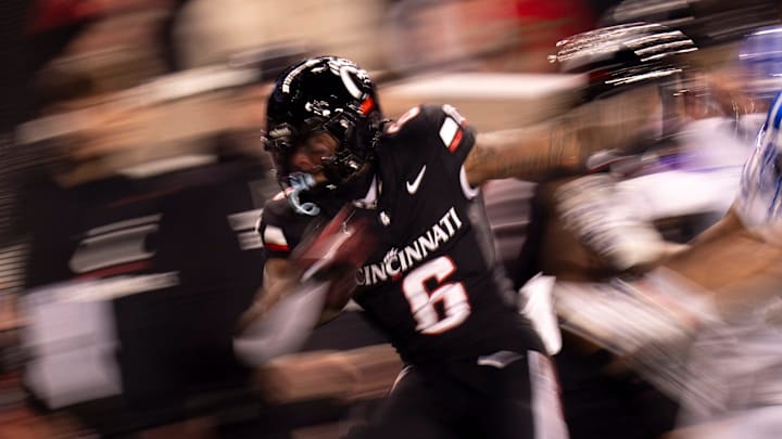 Cincinnati Bearcats running back Evan Pryor (6) is forced out of bounds in the fourth quarter of the NCAA football game between the Cincinnati Bearcats and BYU Cougars at Nippert Stadium in Cincinnati on Nov. 22, 2025.