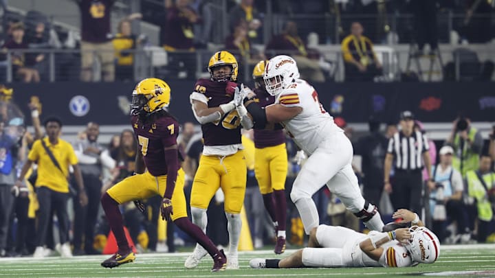 Dec 7, 2024; Arlington, TX, USA;  Arizona State Sun Devils defensive back Shamari Simmons (7) reacts after tackling Iowa State Cyclones quarterback Rocco Becht (3) during the second half at AT&T Stadium. Mandatory Credit: Kevin Jairaj-Imagn Images