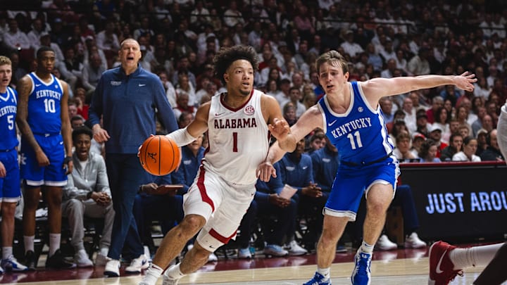 Feb 22, 2025; Tuscaloosa, Alabama, USA; Alabama Crimson Tide guard Mark Sears (1) drives the ball against Kentucky Wildcats guard Travis Perry (11) during the first half at Coleman Coliseum. Mandatory Credit: Will McLelland-Imagn Images Feb 22, 2025; Tuscaloosa, Alabama, USA; Alabama Crimson Tide guard Mark Sears (1) drives the ball against Kentucky Wildcats guard Travis Perry (11) during the first half at Coleman Coliseum. Mandatory Credit: Will McLelland-Imagn Images