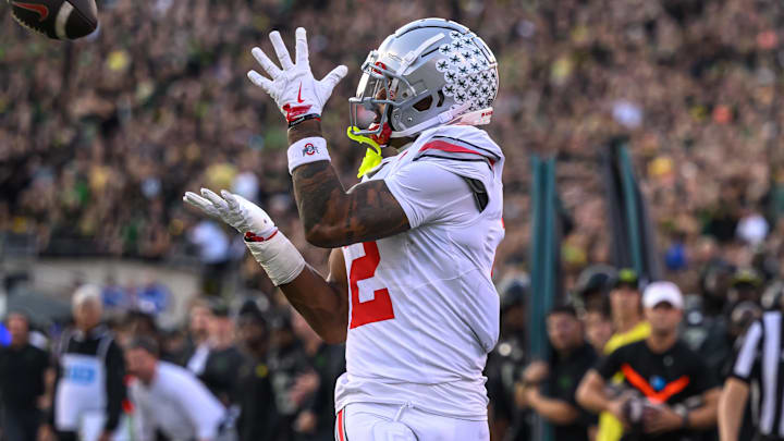 Oct 12, 2024; Eugene, Oregon, USA; Ohio State Buckeyes wide receiver Emeka Egbuka (2) catches a pass for a touchdown during the second quarter against the Oregon Ducks at Autzen Stadium. Mandatory Credit: Craig Strobeck-Imagn Images Oct 12, 2024; Eugene, Oregon, USA; Ohio State Buckeyes wide receiver Emeka Egbuka (2) catches a pass for a touchdown during the second quarter against the Oregon Ducks at Autzen Stadium. Mandatory Credit: Craig Strobeck-Imagn Images