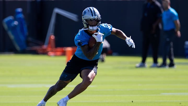 Jul 23, 2025; Charlotte, NC, USA; Carolina Panthers wide receiver Tetairoa McMillan (4) runs with the ball during Panthers Training Camp. Mandatory Credit: Scott Kinser-Imagn Images