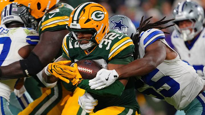 Oct 18, 2026; Green Bay, Wisconsin, USA; Green Bay Packers running back MarShawn Lloyd (32) runs the ball against Dallas Cowboys linebacker Jaishawn Barham (55) during the second half at Lambeau Field. Mandatory Credit: Ross Harried-Imagn Images Oct 18, 2026; Green Bay, Wisconsin, USA; Green Bay Packers running back MarShawn Lloyd (32) runs the ball against Dallas Cowboys linebacker Jaishawn Barham (55) during the second half at Lambeau Field. Mandatory Credit: Ross Harried-Imagn Images