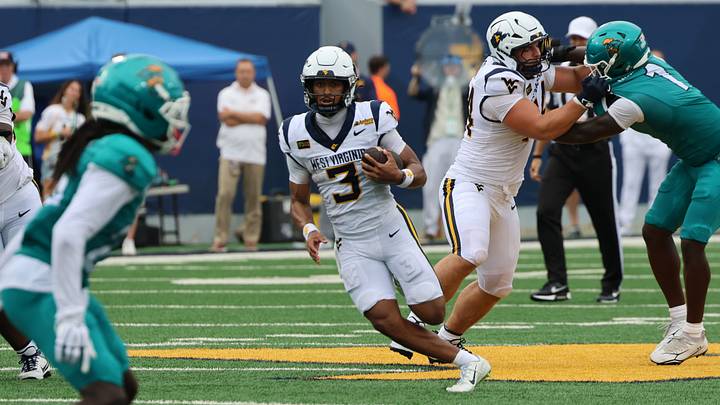 West Virginia University quarterback Michael Hawkins Jr. West Virginia University quarterback Michael Hawkins Jr.