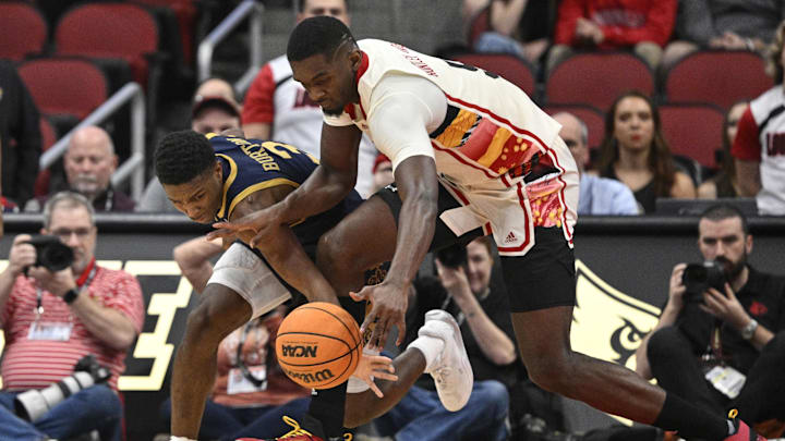 Feb 21, 2024; Louisville, Kentucky, USA; Notre Dame Fighting Irish guard Markus Burton (3) scrambles