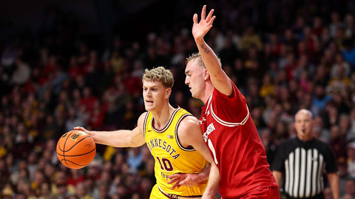 Jan 13, 2026; Minneapolis, Minnesota, USA; Minnesota Golden Gophers forward Cade Tyson (10) works around Wisconsin Badgers guard Andrew Rohde (7) during the first half at Williams Arena. Mandatory Credit: Matt Krohn-Imagn Images Jan 13, 2026; Minneapolis, Minnesota, USA; Minnesota Golden Gophers forward Cade Tyson (10) works around Wisconsin Badgers guard Andrew Rohde (7) during the first half at Williams Arena. Mandatory Credit: Matt Krohn-Imagn Images