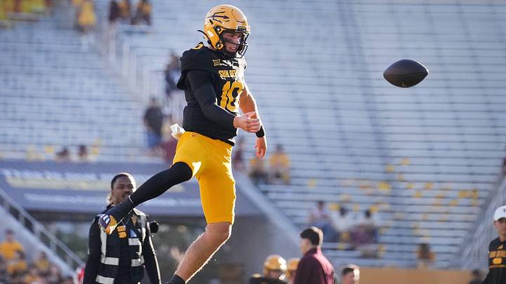 ASU Sun Devils quarterback Sam Leavitt (10) warms up before the game against the Houston Cougars at Mountain America Stadium in Tempe on Oct. 25, 2025.