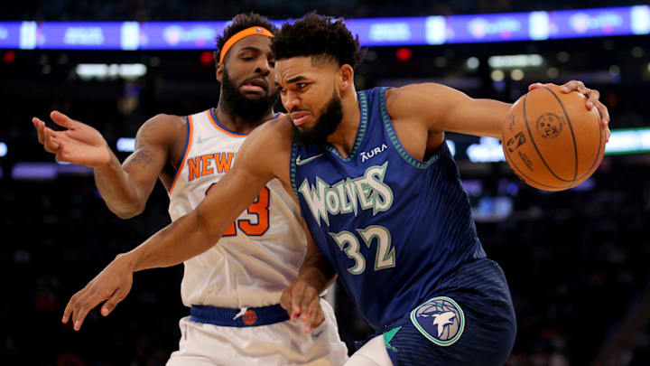 Jan 18, 2022; New York, New York, USA; Minnesota Timberwolves center Karl-Anthony Towns (32) drives to the basket against New York Knicks center Mitchell Robinson (23) during the first quarter at Madison Square Garden. Mandatory Credit: Brad Penner-Imagn Images