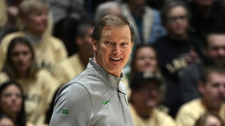 Feb 7, 2026; West Lafayette, Indiana, USA; Oregon Ducks head coach Dana Altman smiles after a basket during the first half against the Purdue Boilermakers at Mackey Arena. Mandatory Credit: Marc Lebryk-Imagn Images Feb 7, 2026; West Lafayette, Indiana, USA; Oregon Ducks head coach Dana Altman smiles after a basket during the first half against the Purdue Boilermakers at Mackey Arena. Mandatory Credit: Marc Lebryk-Imagn Images